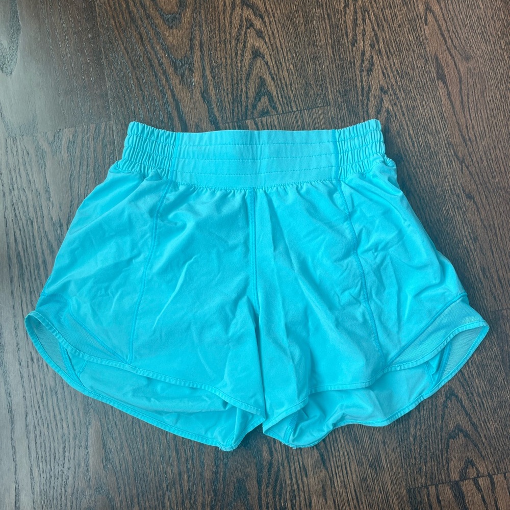 Lululemon 4 inch HOTTY HOTS size 4 high waisted electric blue